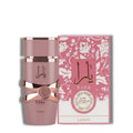 Lattafa Yara Elixir Women EDP 100ml — frasco rosa palo con lazo rose gold y caja rosa floral